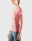 woman wearing pink t-shirt and trousers