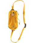 Yellow backpack with a strap on a white background