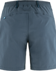 Blue shorts with a small sweden flag on a white background