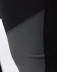 close up stitching of a port-iron grey tights