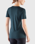 woman in navy round neck t-shirt