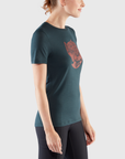 woman in navy round neck t-shirt and black tights