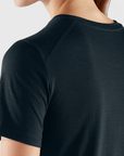 details of the fabric of a black t-shirt