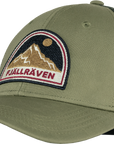 green baseball cap