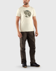 man in white round neck t-shirt and brown trekking trousers