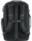 Black backpack with multiple straps on a white background