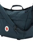 Blue shoulder bag with a visible fjallraven logo on a white background