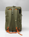 Green backpack with orange straps on a white background