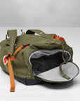 open compartment of a green duffel bag with a Fjällräven logo
