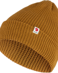 acorn knitted beanie hat with Fjällräven logo