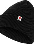 black knitted beanie hat with Fjällräven logo