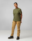 woman wearing green round t-shirtand brown trousers