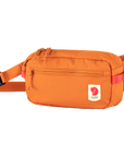 sunset orange waist bag with a visible Fjällräven logo
