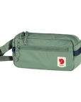 patina green waist bag with a visible Fjällräven logo