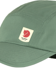 patina green baseball cap with Fjällräven logo with sweden flag tag