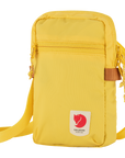 mellow yellow small sling bag with Fjällräven logo