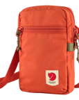 orange small sling bag with Fjällräven logo