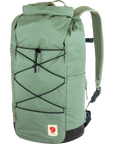 patina green backpack with rolltop and bungee cord