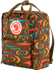 Brown backpack with colorful pattern and Fjällräven Kånken logo on a white background