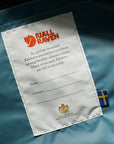Fjällräven label on a blue fabric background
