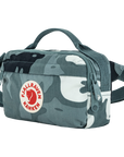 Camouflage-patterned waist bag with Fjällräven Kånken logo on a white background