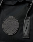 leather logo of the kanken black backpack