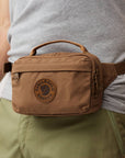 hazel brown sling bag waist pouch with Fjällräven logo