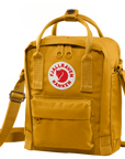 ochre sling bag with Fjällräven Kånken logo