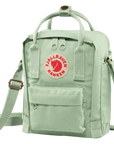 mint green sling bag with Fjällräven Kånken logo
