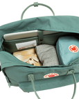 interior of frost green duffel bag with Fjällräven logo