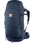 A blue Fjällräven backpack with adjustable straps and a wooden frame design.