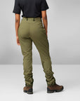 green trekking trousers and brown boots