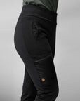 pocket and zip detail of a black trekking trousers