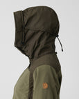 Green and brown jacket with a hood on a light gray background