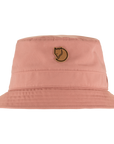 dusty rose bucket hat with arctic fox logo