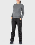 woman wearing grey top and black trekking trousers