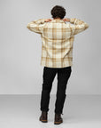 chalk white-dune beige checkered shirt and black trousers