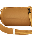 Brown waist bag pouch with a strap on a white background
