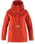 Orange jacket with a fjallraven label on a white background