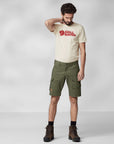 man wearing white Fjällräven t-shirt and green bermudas shorts