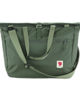 Green tote bag with shoulder strap on a white background