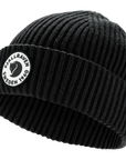 Black knit beanie with Fjällräven logo on a white background