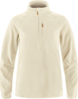 Beige fleece jacket with a quarter zip on a white background