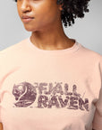 woman wearing pink round neck t-shirt