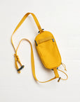 Yellow crossbody bag on a white background