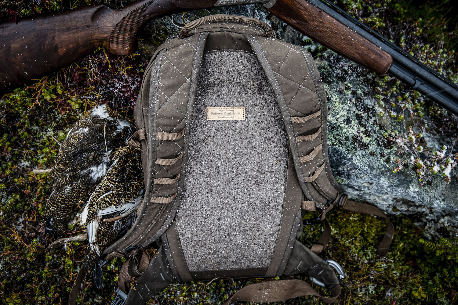 Backpack with a textured back panel on a natural background