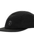 Black cap with a arctic fox logo on a white background