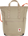 Beige backpack with orange straps on a white background