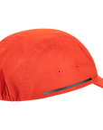 Orange cap with a reflective strip on a white background