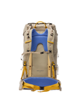 Beige backpack with blue cushion and yellow straps and on a white background